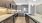 Kitchen with ample natural lighting and stainless appliances
