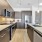 Kitchen with ample natural lighting and stainless appliances