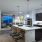 a kitchen with a table and chairs