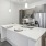 Well-lit kitchen with ample counter space